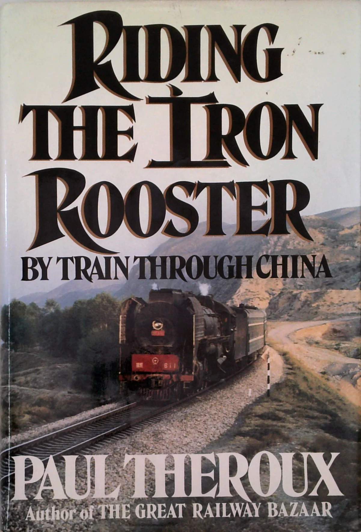 Riding The Iron Rooster: By Train Through China